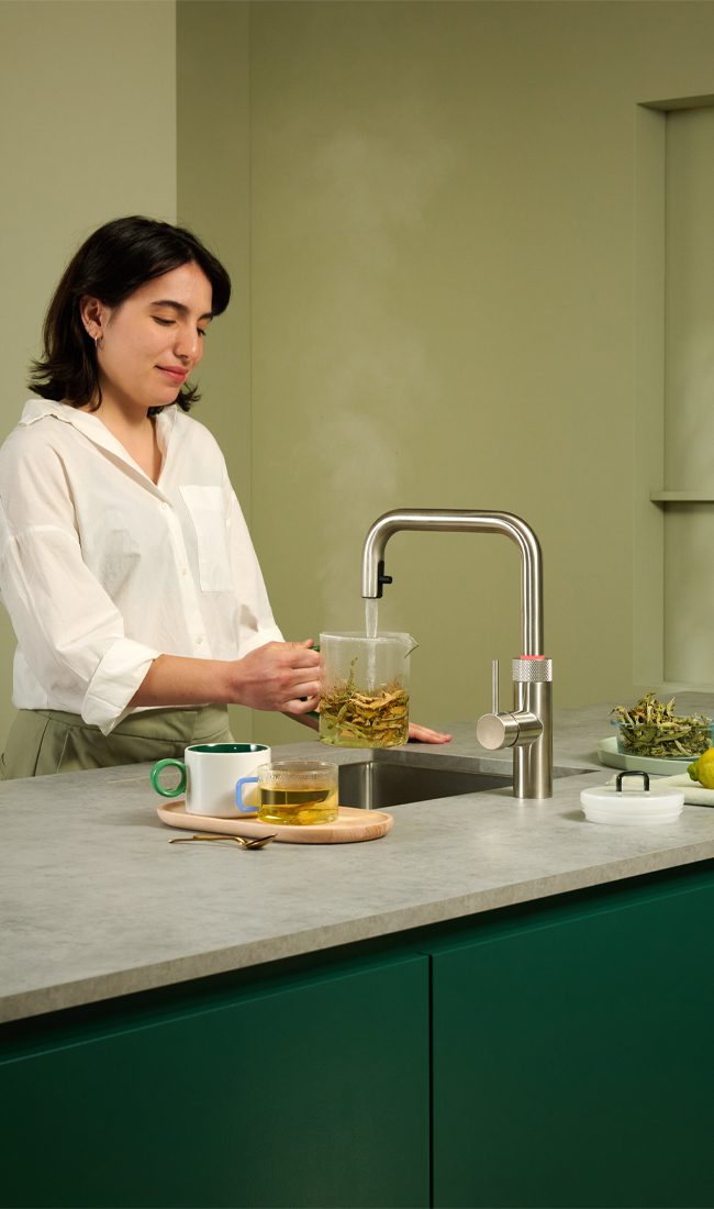 A stainless steel Quooker boiling water tap