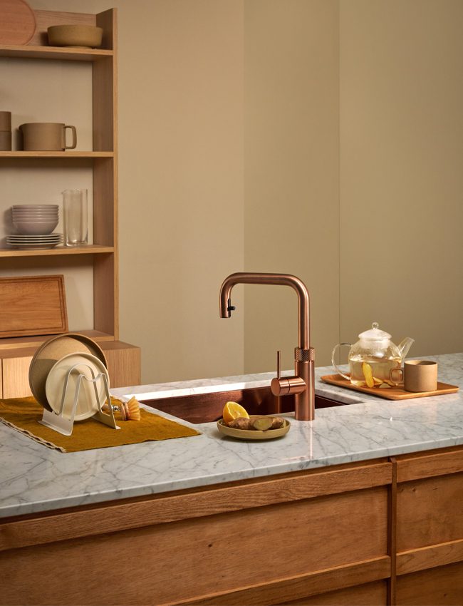 A rose gold Quooker boiling water tap