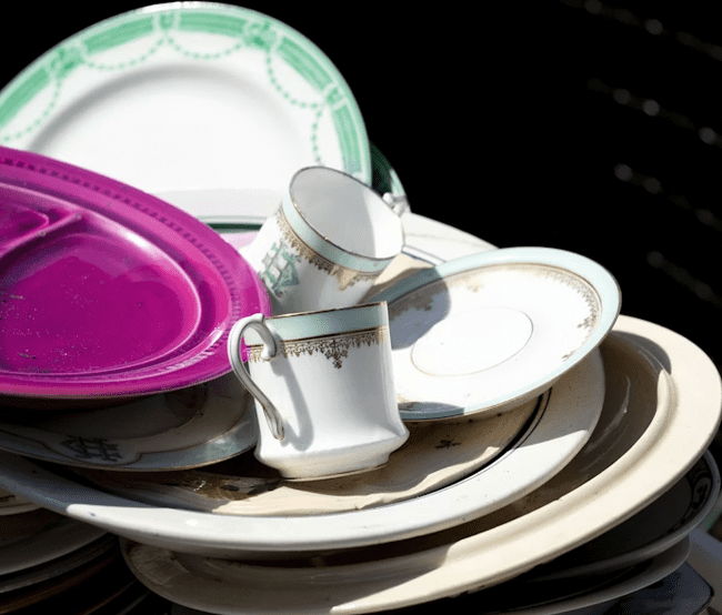 stacked dirty dishes