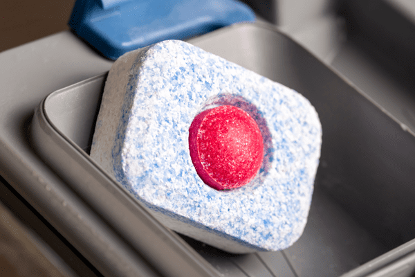 Close up of a dishwasher tablet