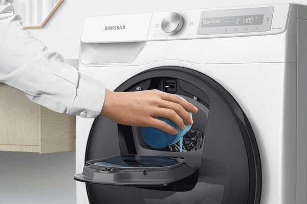 a white freestanding Samsung washer dryer