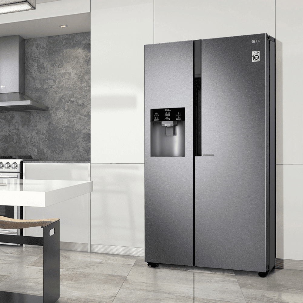 Image of a large LG American style fridge freezer finished in stainless steel, in a white, open plan kitchen