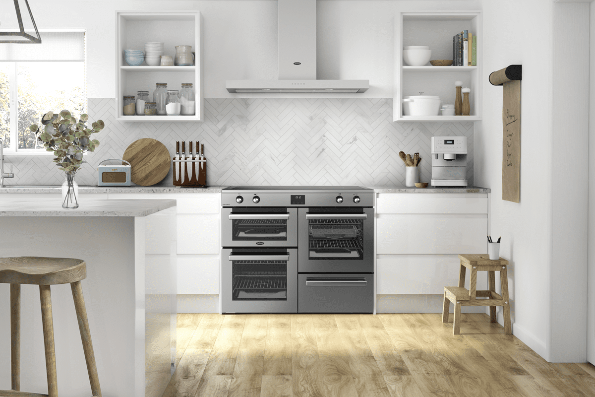 Image of a light and bright, white kitchen featuring a slate grey Belling range cooker and flat chimney hood.