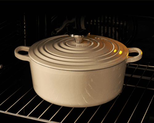 Image of a slow cooker pot inside the oven cavity of a Belling range cooker