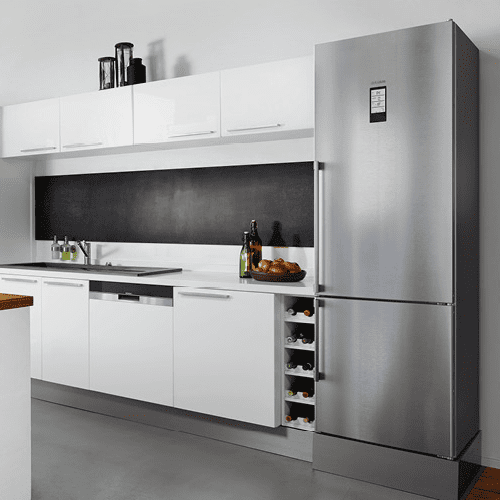 Large Siemens fridge freezer in stainless steel. Featured in a white modern kitchen.