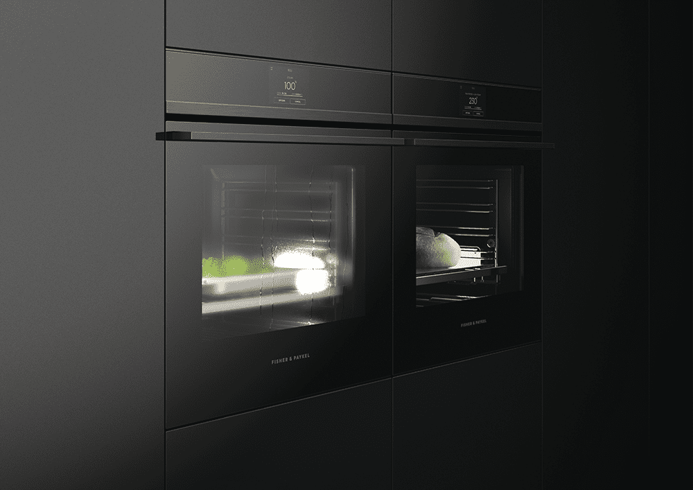 Close up of two built in black Fisher & Paykel appliances including a single oven and a steam oven