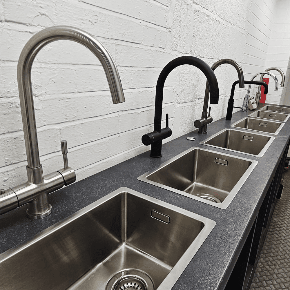 Image of a row of boiling water taps on display in our showroom