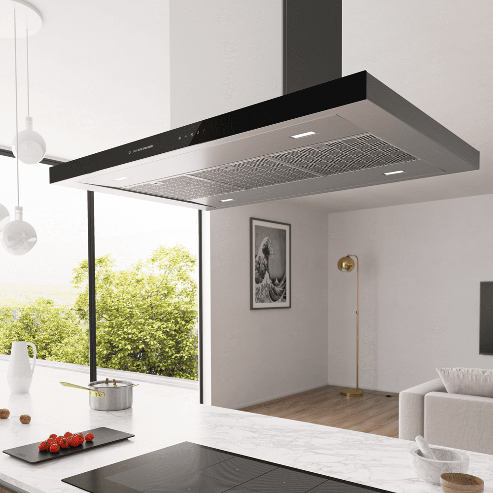 Image of a Franke island hood positioned over an induction hob in a white open plan kitchen