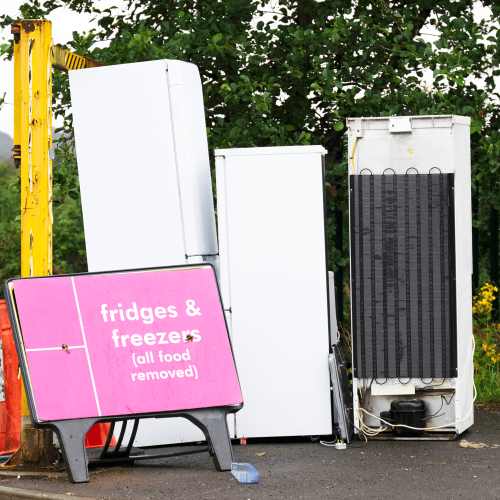 image of several old appliances ready to be recycled at a local tip