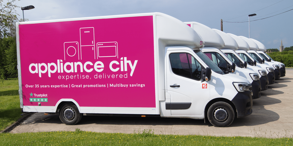 Image of our vans all parked in a row