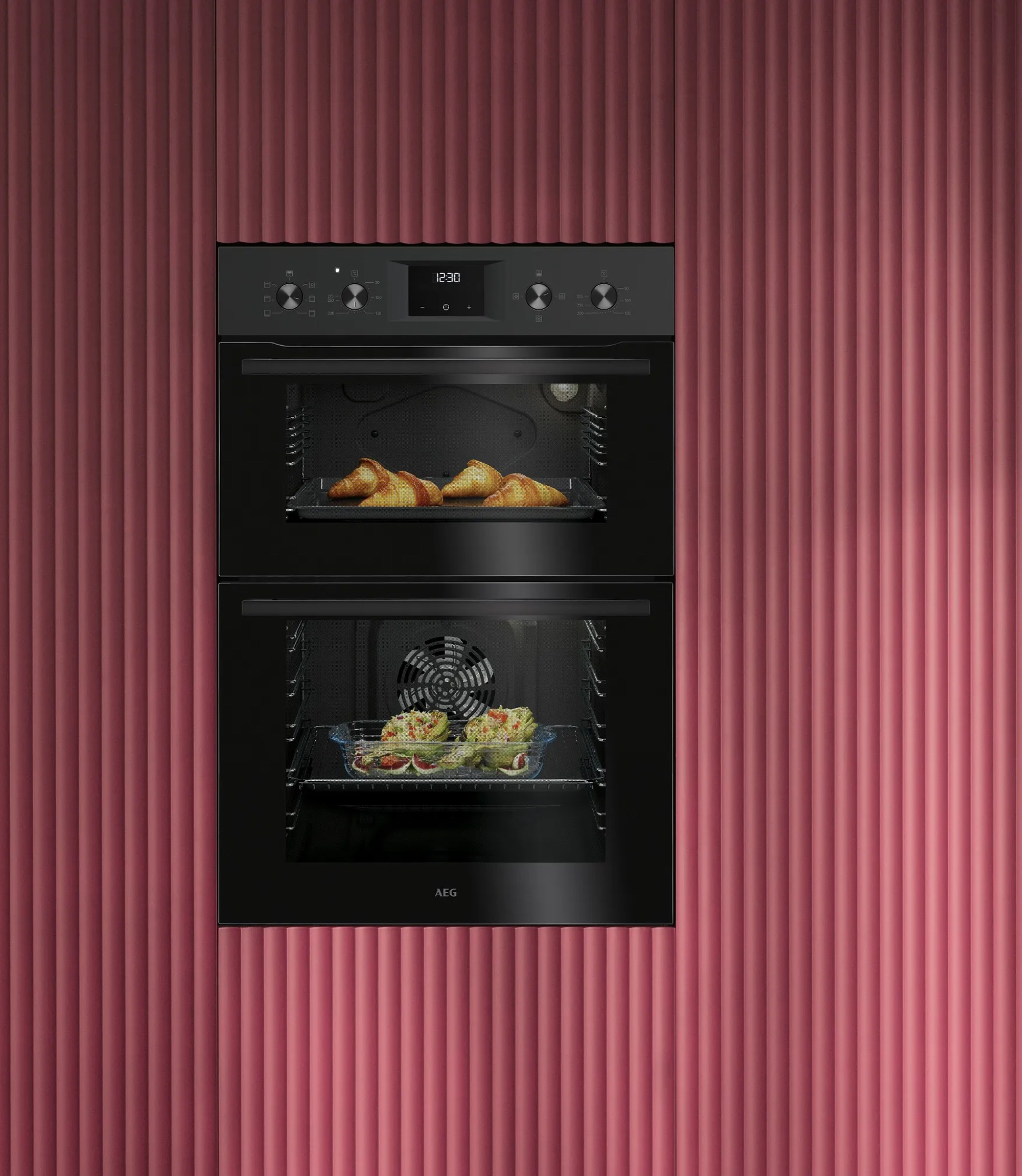 an image of a black aeg built in double oven